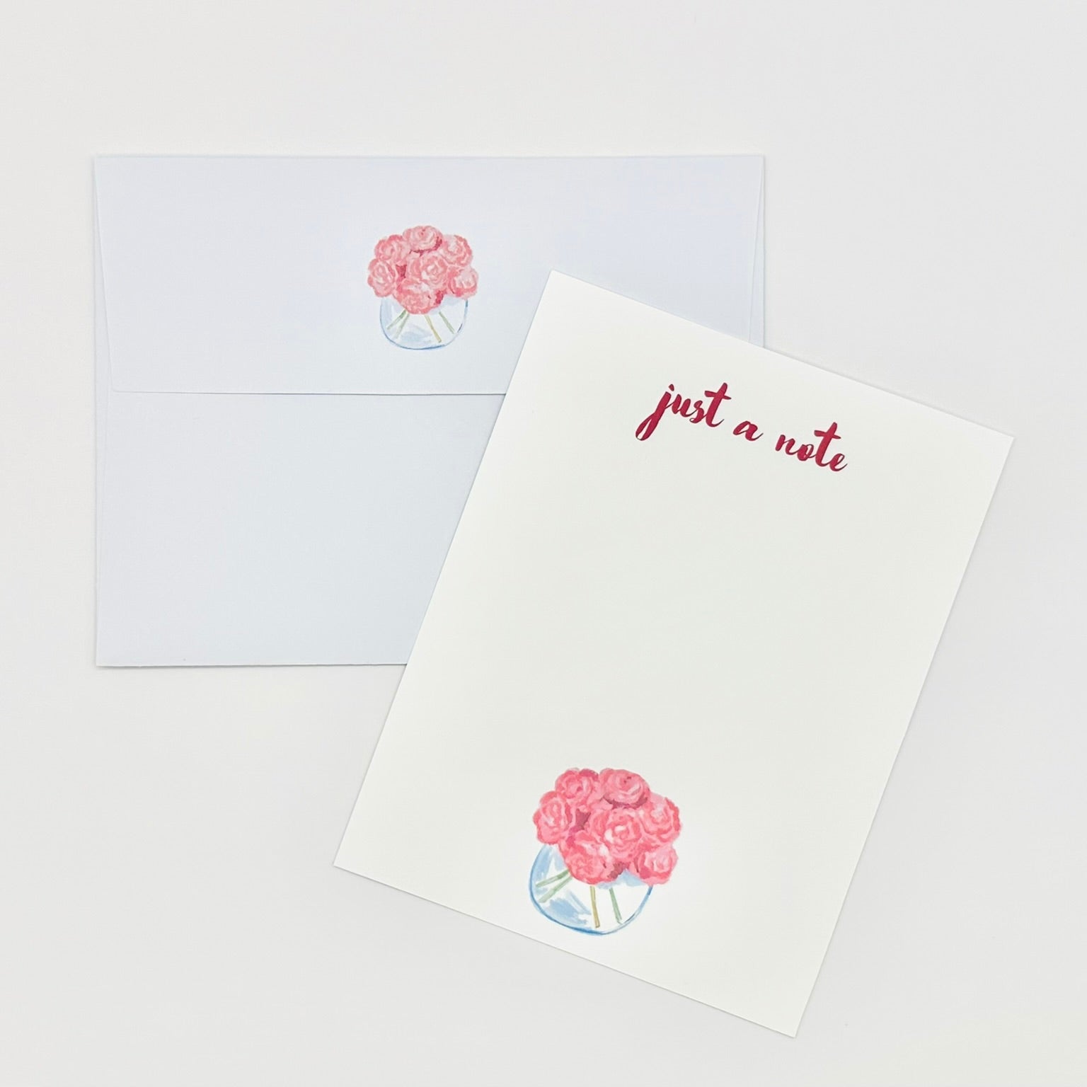 Note cards with floral designs and 'just a note' text on a white background